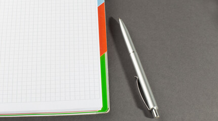 Poster - blank white notebook on the gray background