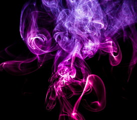 Colored smoke on black background