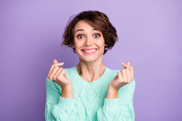 Poster - Portrait of attractive cheerful funny brown-haired girl showing love gesture isolated over violet purple color background