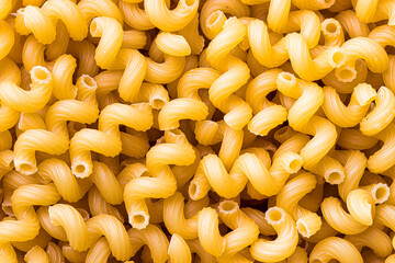 Italian pasta cellentani abstract backdrop. Traditional food.