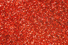 Glittering Background Of Red Sequins Closeup. Sparkle Festive Texture