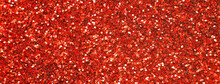 Glittering Background Of Red Sequins Closeup. Sparkle Festive Texture. Banner