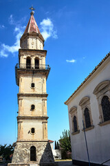 Poster - The stone bell tower of the Orthodox Church on the island of Zakynthos