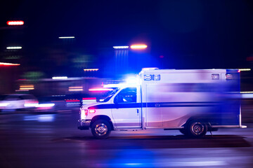 Wall Mural - An ambulance races to respond to the scene of an emergency.