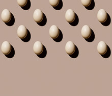 Chicken Eggs On Beige Background Pattern