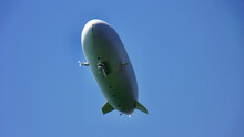 Low Angle View Of A Dirigible Balloon In The Blue Clear Sky