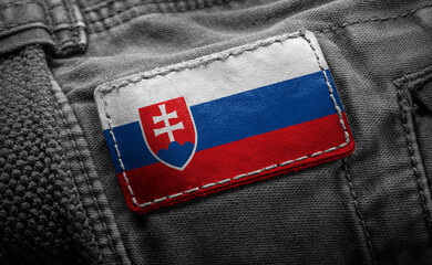 Tag on dark clothing in the form of the flag of the Slovakia