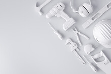 Top View Of Monochrome Construction Tools For Repair And Installation On White