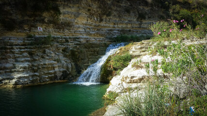 Canvas Print - Cascade at the natural reserve Cavagrande del Cassibile, near Avola city, Sicily