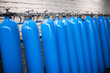 Oxygen cylinder with compressed gas. Blue Oxygen tanks for industry. Liquefied oxygen production. Factory