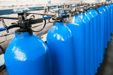 Oxygen Cylinder With Compressed Gas. Blue Oxygen Tanks For Industry. Liquefied Oxygen Production. Factory