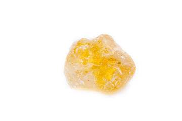 Macro mineral stone Granat (grossular) yellow green on a white background