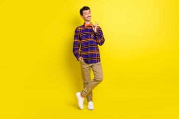 Sticker - Full length photo of young handsome man happy positive smile fix bowtie date event cool isolated over yellow color background