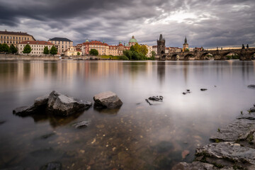 View of the river with stones in Prague