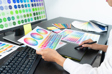 Poster - interior designer or creative graphic designer working on project architectural with colour samples 