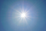 Fototapeta Niebo - Clear blue sky, sun, beautiful sunbeams and glare