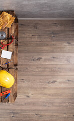 Wall Mural - Set of tools and construction instruments on wood floor background. Work repair renovation concept