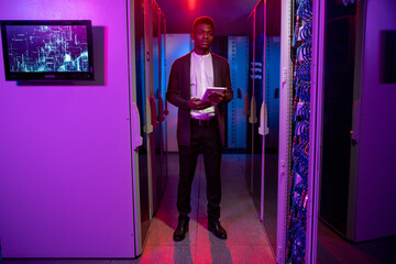 Poster - Young African-American network engineer with tablet