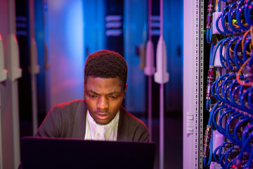 Poster - Busy IT engineer administrating computer network