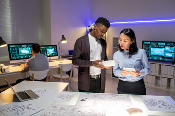 Poster - Vehicle designers working on new model of car