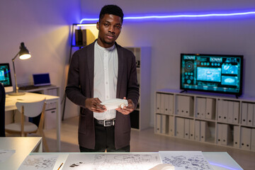 Poster - African-American engineer building prototypes of car components