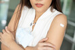 © 9nong - Unhealthy Asian woman getting vaccinated immunity with adverse effects, concept of inoculation, vaccination, side effects of vaccine, muscle pain, swelling, redness, chills, nausea, fever, tiredness