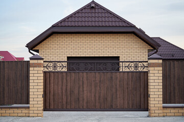 Wall Mural - Metal wrought side sliding gates with ornate elements.