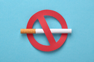 No smoking icon. Red forbidden sign with a cigarette on blue. No tobacco day, no smoking concept.