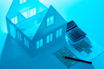 Poster - architectural drawings as a symbol of home design. calculator next to layout of house. concept - eng