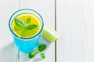 Wall Mural - Blue cocktail with mint and citrus. Healthy and varied diet.