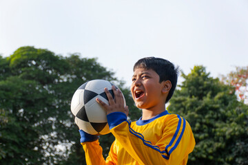 Soccer player shouting on the park	