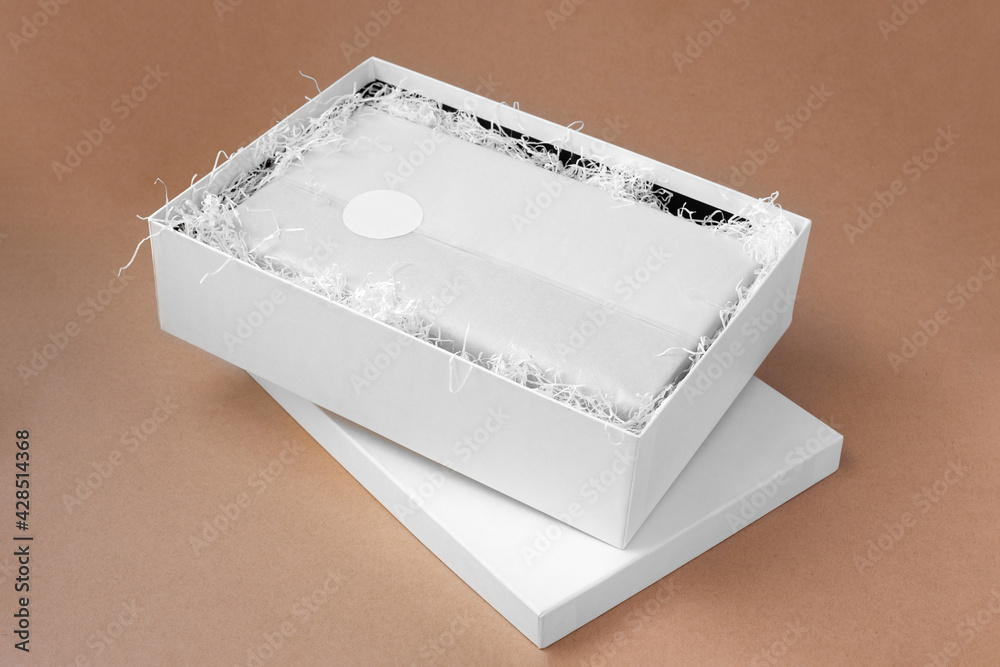mock-up round blank sticker or tag for brand or logo on white tissue ...