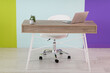 © .shock - home office concept. chair, laptop, desk and flowers.