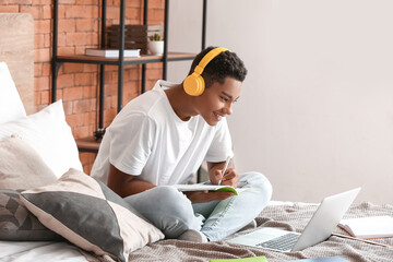 African-American student studying online at home