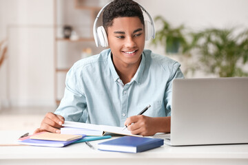 African-American student studying online at home