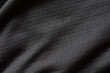 © Kwangmoozaa - Black sport cloth fabric football shirt jersey texture close up