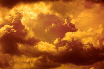 Wall Mural - golden sunset. dramatic orange yellow sky. thunderclouds. colorful sky background with copy space fo