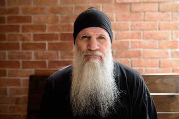 Sticker - Portrait of mature man with long gray beard