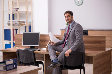 Young businessman employee working in the office