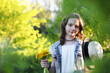 © alexkich - Girl in the park in the spring