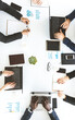 © xartproduction - Group of young business people working and communicating while sitting at the office desk together with colleagues sitting. business meeting. Desktop top view.