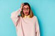© Asier - Young student caucasian woman isolated on blue background tired and very sleepy keeping hand on head.
