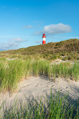 Wall Mural - lighthouse list ost on the dune beach, sylt, schleswig-holstein, germany