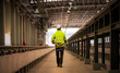 © APchanel - Engineer railway under inspection and checking construction process train work shop and railroad station .Engineer wearing safety uniform and helmet by holding detail in work.