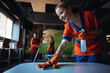 Three female workers using various janitorial supplies during the clean-up