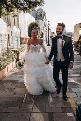 Sticker - The bride and groom travel through the Italian city. An evening walk.