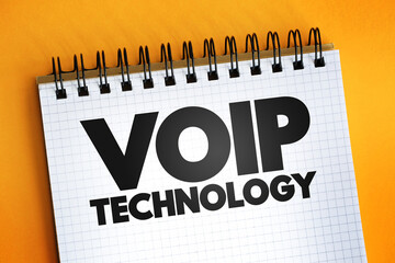 Poster - Voip Technology text quote on notepad, concept background.