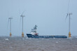 Zero carbon emission electricty production. Supply ship between wind turbines