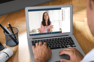 Wall Mural - Human resources manager conducting online job interview via video chat