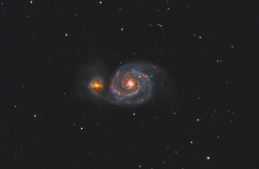 close up of messier 51 galaxy, located in canes venatici constellation, taken with my telescope.